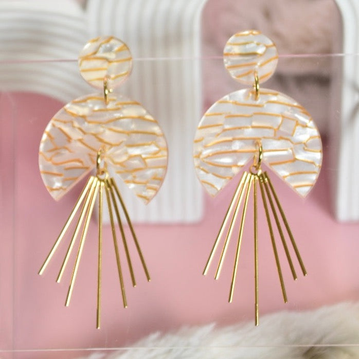 Elegant chic statement earrings featuring gold radiant spikes