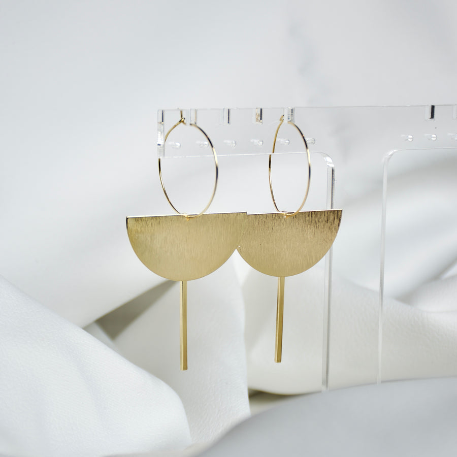 Sleek modern geometric hoop earrings in gold